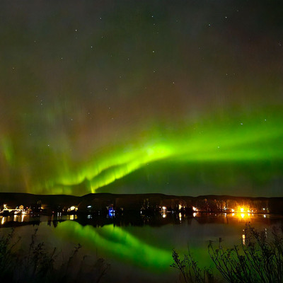 Northern lights reflecting in the lake @saskstormchaser 