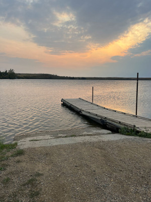 Cement launch and wooden dock.