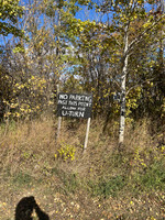 Boat launch parking lot sign.