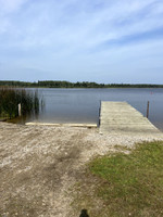 Cement boat launch and dock.