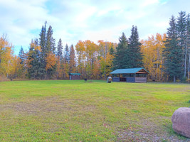 Covered picnic area and outhouse just off the highway.