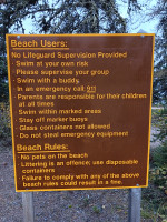 Beach rules sign.