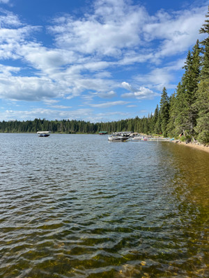 Boats in front of the cabins.
