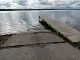 Cement boat launch and dock.