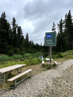 Picnic tables and signage at launch.