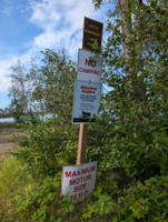 Sign when you take the road to the boat launch area