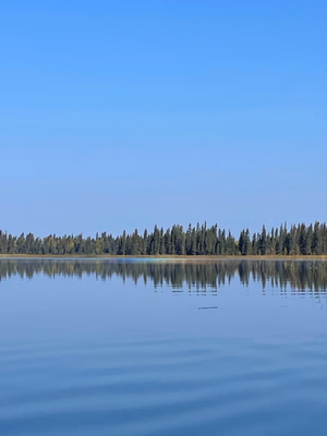 Rainbow on the water at Anglin Lake photo by Diane Chubak