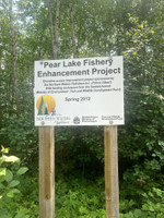 Pear Lake Fishery Enhancement Project sign.